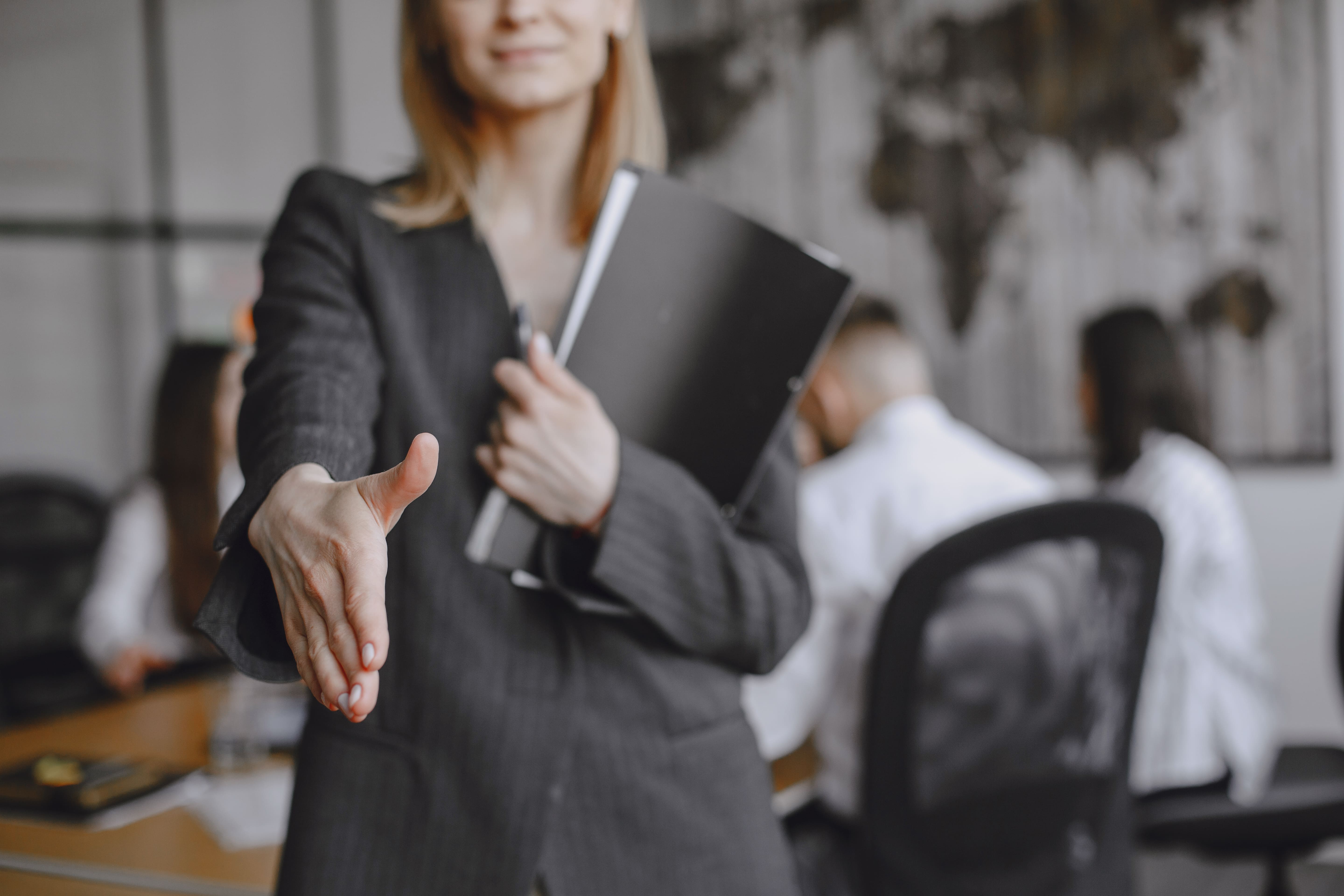 girl-signs-the-documents-lady-sitting-on-the-table-manager-working-in-the-office (1)_288.jpg